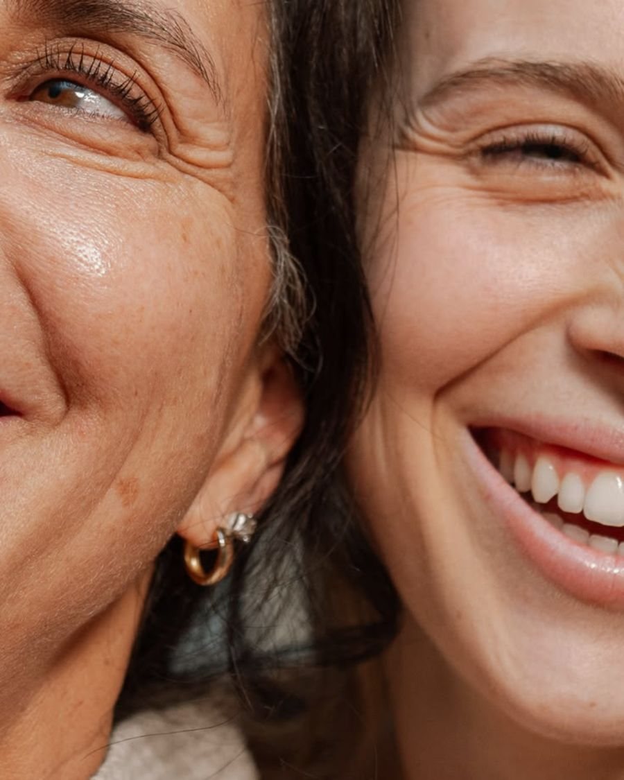 Smiling woman with freckles laughing